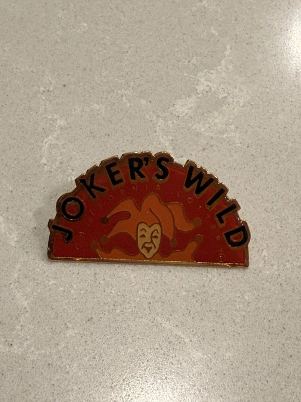Joker's Wild California Lottery Lapel Pin Orange Red Color Pin, 1.4 x 0.75 Clean